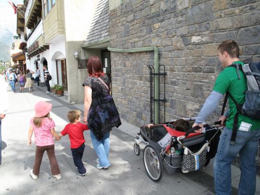 family walking in the street for a tour