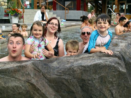 family photo at the pool area of the resort