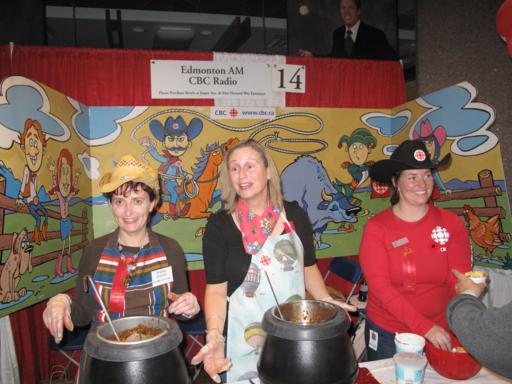 three ladies in cowboy outfit in AM CBC Radio booth