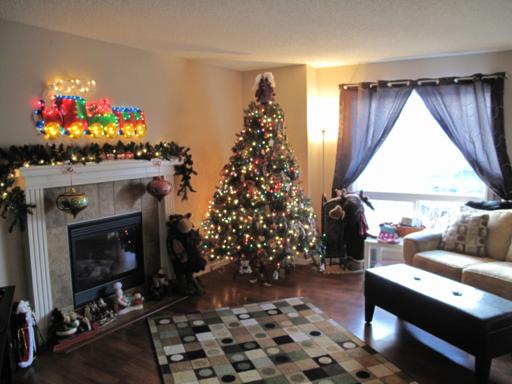 lighted Christmas tree and other decor all set up