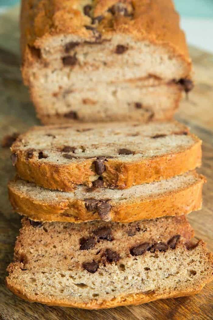 Close up shot of banana bread on wooden board