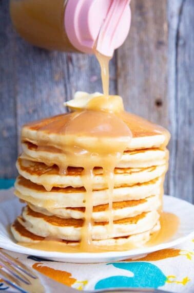 stack of Homemade Pancakes with Butter & Brown Sugar Sauce