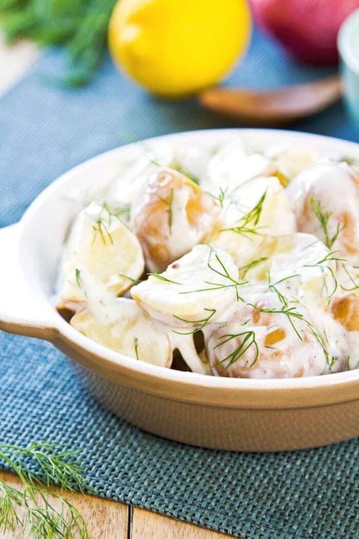 close up of Ukrainian Style Creamed Dill Potatoes in a bowl