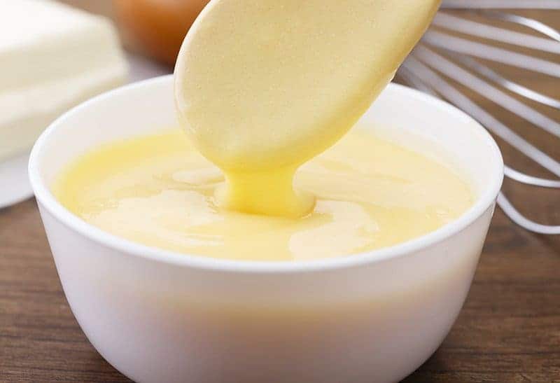 buttery Blender Hollandaise Sauce in a white dipping bowl