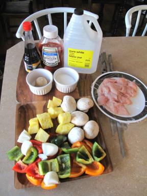 Ingredients needed for Sweet & Sour Chicken Shish Kabobs all in the top of table