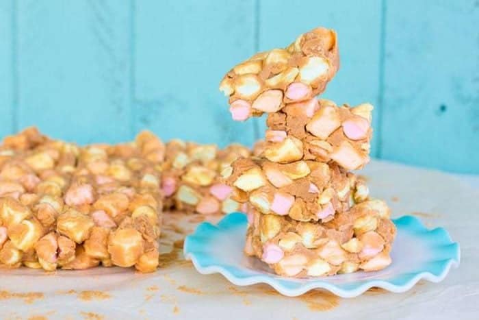 Stack of Peanut Butter Marshmallow Squares / Confetti Bars in ruffle plate
