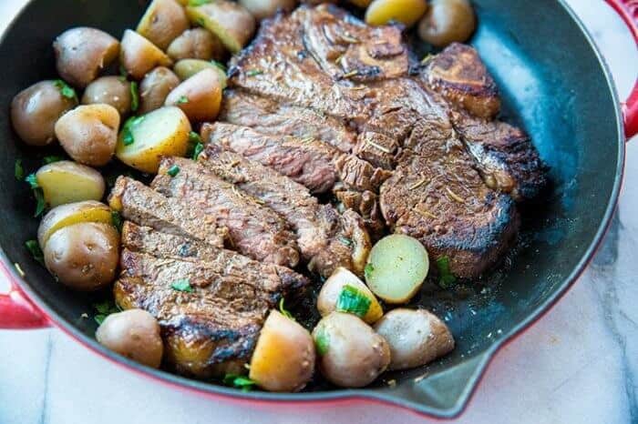 T-Bone Steak marinated and BBQ'd with sliced mini potatoes