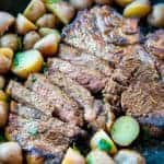 sliced Marinated then Barbecued T-Bone steak with sliced mini potatoes