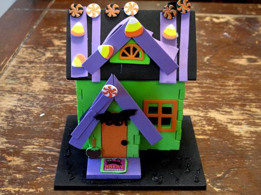 miniature of colored violet and green crazy witches house