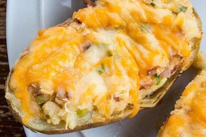 close up Twice baked potatoes on a white plate