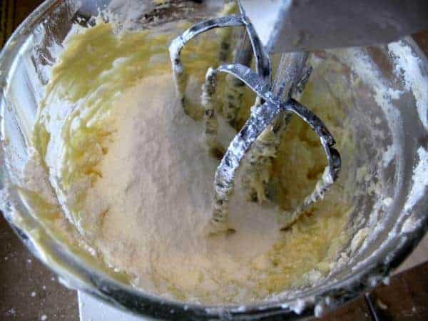 beating the mixture of Whipped Shortbread using a mixer