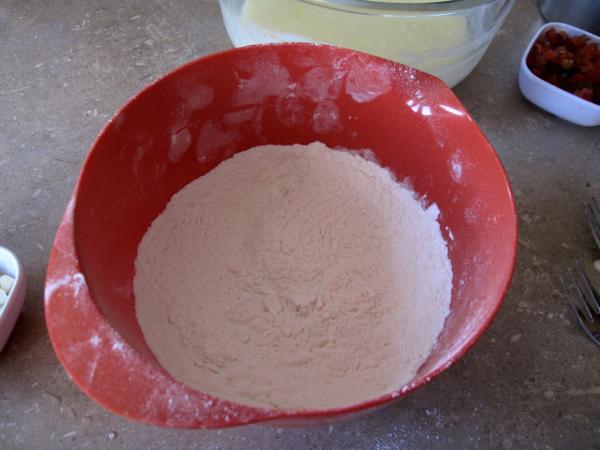 flour, baking powder and salt together in a red bowl