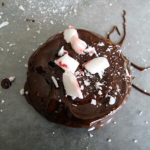 Chocolate Covered Ritz Crackers with crushed candy cane on top