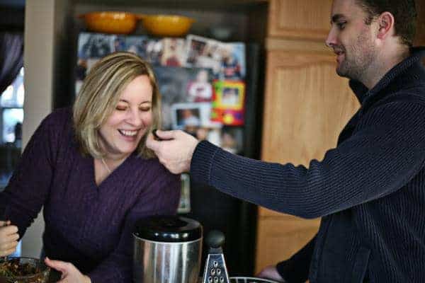 mom and dad having fun while preparing the ingredients