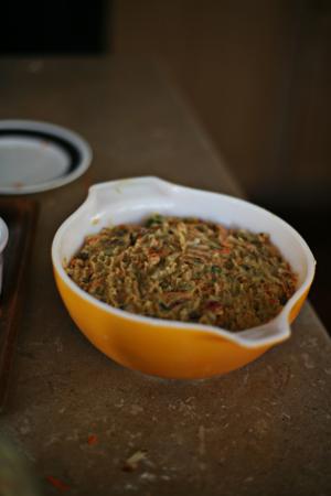 close up Christmas Pudding in an orange bowl