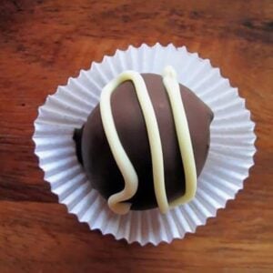 Chocolate Truffles with white chocolate topping on a cupcake liner