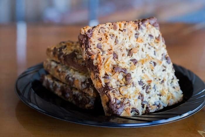 slices of Seven layer bars in a dessert plate