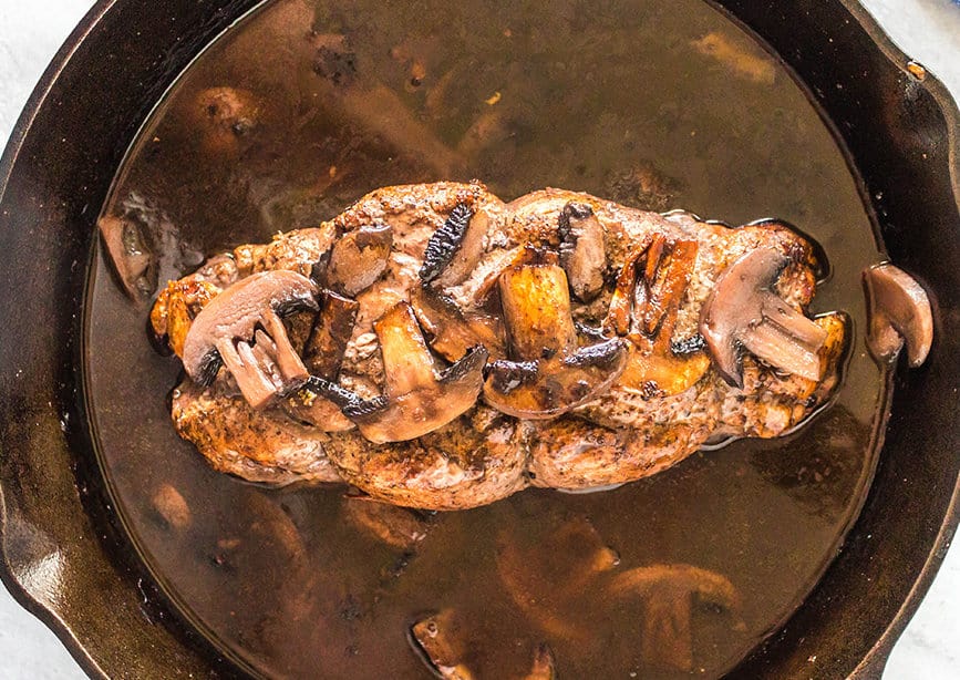 Red Wine & Mushroom Pork Tenderloin in a skillet