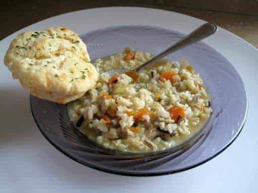 Cornish Game Hen Soup in a Plate Bowl with Best Biscuits Ever on side