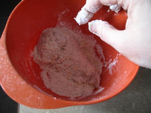 dipping the chicken again into flour mixture for another coating