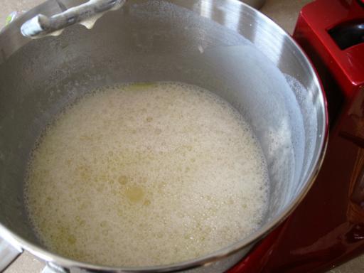 adding yeast into the bowl for dough for Ukrainian Babka/Paska or Ukrainian Easter Bread