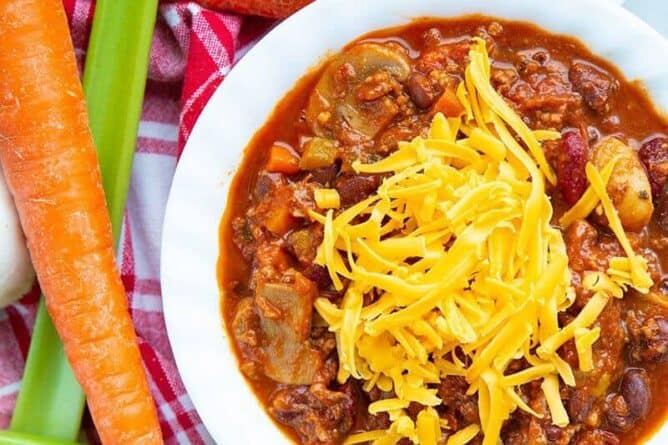 close up Sink Chili topped with shredded cheese