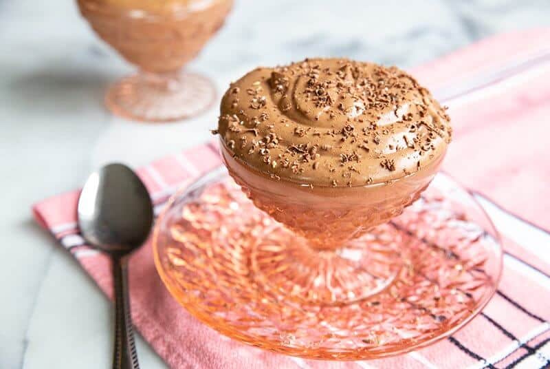 Chocolate Mousse in Pink Depression Glass Sherbet with a pink kitchen cloth underneath