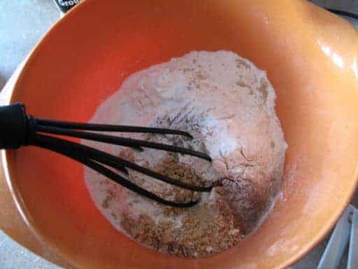 whisking all the dry ingredients in a bowl