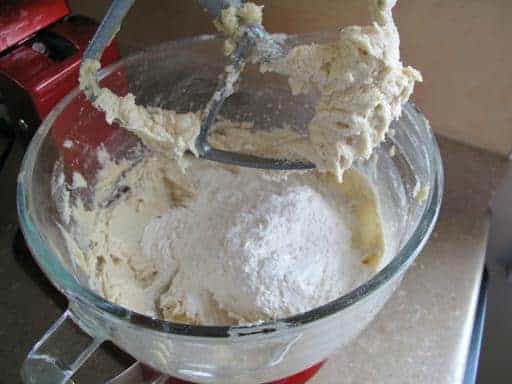 blending in the flour and baking soda mix