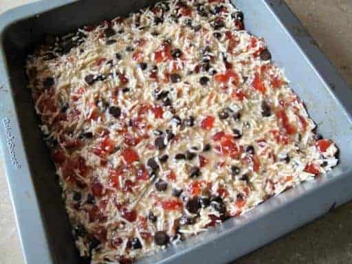 combined ingredients for Chocolate Cherry Squares in a baking pan