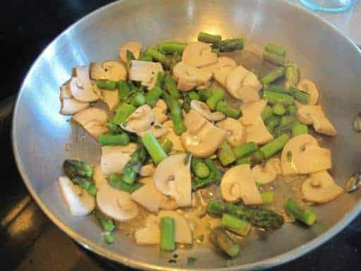 frying the mushrooms and asparagus