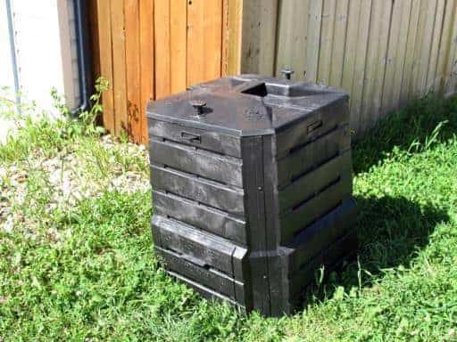 beautiful new black composter in the yard
