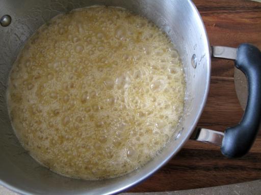 large saucepan with combined brown sugar, butter and corn syrup boiling