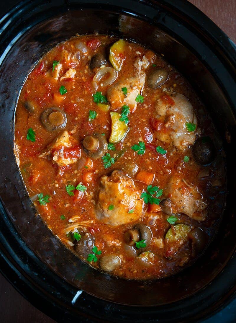 close up Crockpot with Chicken Cacciatore simmering 