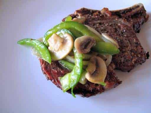BBQ’d Steak With Sauteed Vegetables on top