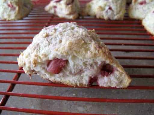 Strawberry Yogurt Scones in red cooling rack showing the inside of it