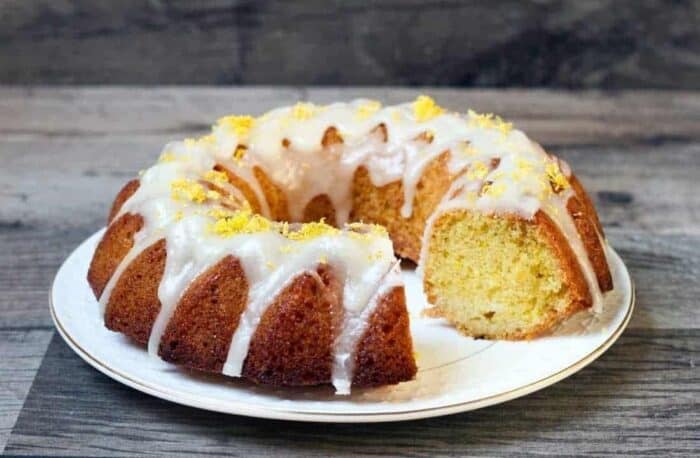 Lemon Bundt Cake with delicious lemon buttercream icing in a white plate