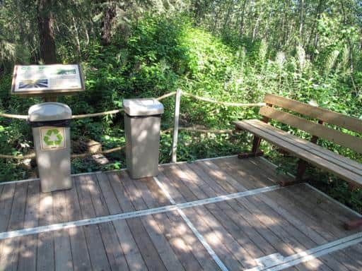 rest points, recycling and garbage bins along the walk