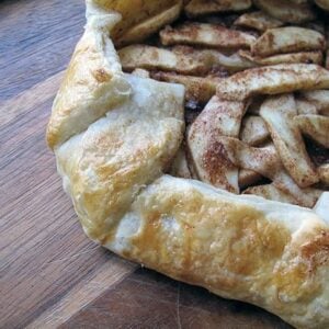 close up of a rustic Apple Galette in wood background