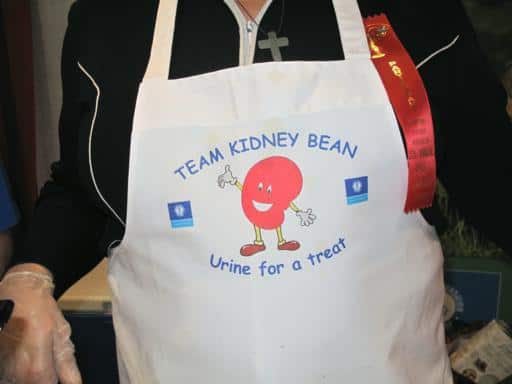 close up of white kitchen apron by Kidney Foundation