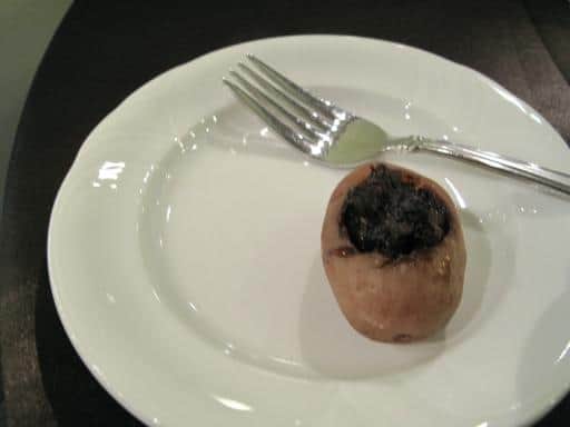 White Plate with Braised Spring Creek Ranch Beef stuffed in a baby potato
