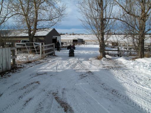 christmaseve2_512x384 a kid riding a Ski-Doo