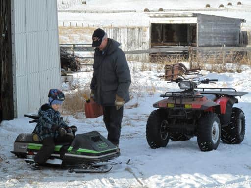 christmaseve6_512x384 adding gas to the Ski-Doo