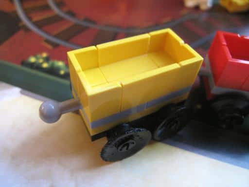 close up of little yellow wagon lego