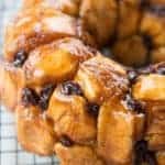 Close up of homemade monkey bread with raisins and brown sugar coating