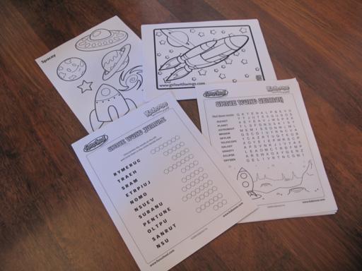 coloring sheets and activities about space in wood background
