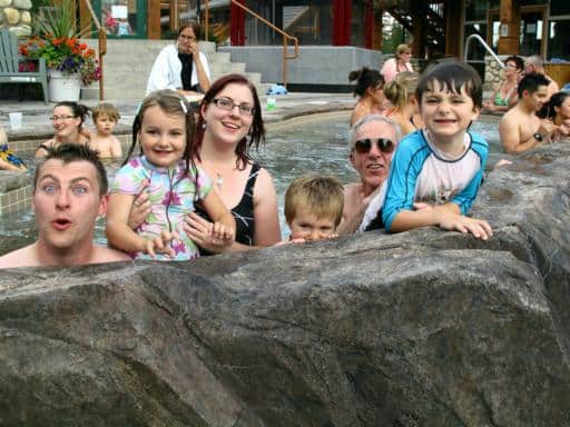 group photo of the family in the pool area