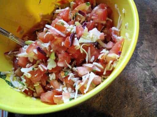 yellow bowl of salsa with cabbage