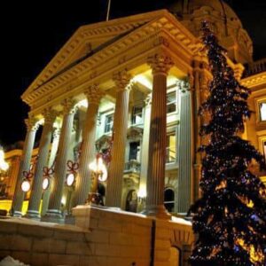 view of lighted Alberta Legislature from outside during Christmas season