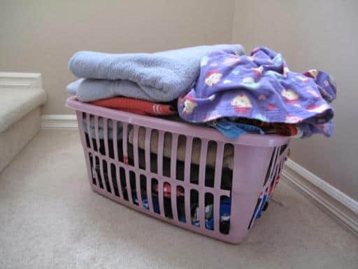 a basket of laundry in the stair